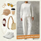 Conjunto de 2 peças composto por blusa de manga comprida com gola redonda e calça.