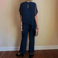 Conjunto encantador de blusa irregular e calça pantalona