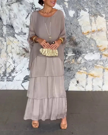 💎 -50% DE DESCONTO LIMITADO! 💎 Vestido Maxi Artístico – Caimento Solto, Decote Morcego e Elegância Fluida
