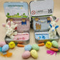 🐇 62% OFF! 🐇 Bunny Mummy & Baby Plush Pocket Tin – Handmade Easter Collectible with Cozy Blanket (Pink/Blue Ears) 🐇🎁