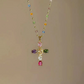 💎 50% DE DESCONTO!! ✝️ Colar colorido com pingente de cruz de strass – brilho intenso, comprimento ajustável e um visual marcante ✨