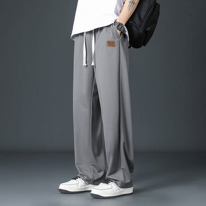 Calça masculina casual, leve, de secagem rápida e com tecido elástico, corte reto.