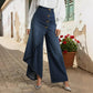 👖 50% DE DESCONTO AGORA! ✨ Calça-saia jeans assimétrica com amarração – Cintura alta, pernas largas e carcela com botões decorativos 🌟
