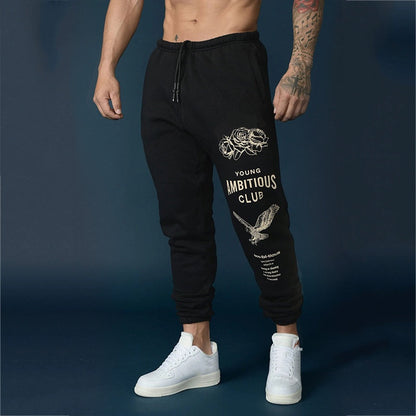 Calça de moletom masculina com estampa gráfica e cordão.