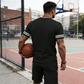 Conjunto de camiseta listrada masculina e shorts
