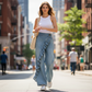 Calça jeans de perna larga com babados assimétricos femininos