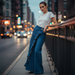 Calça jeans de perna larga com babados assimétricos femininos