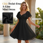 Vestido com mangas bufantes, costas nuas e laço.