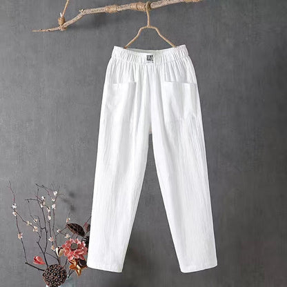 Calças soltas elegantes femininas