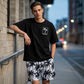Conjunto de camiseta e shorts estampados para homem (2 peças)