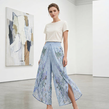 Calças femininas de cintura alta e pernas largas com estampa floral.